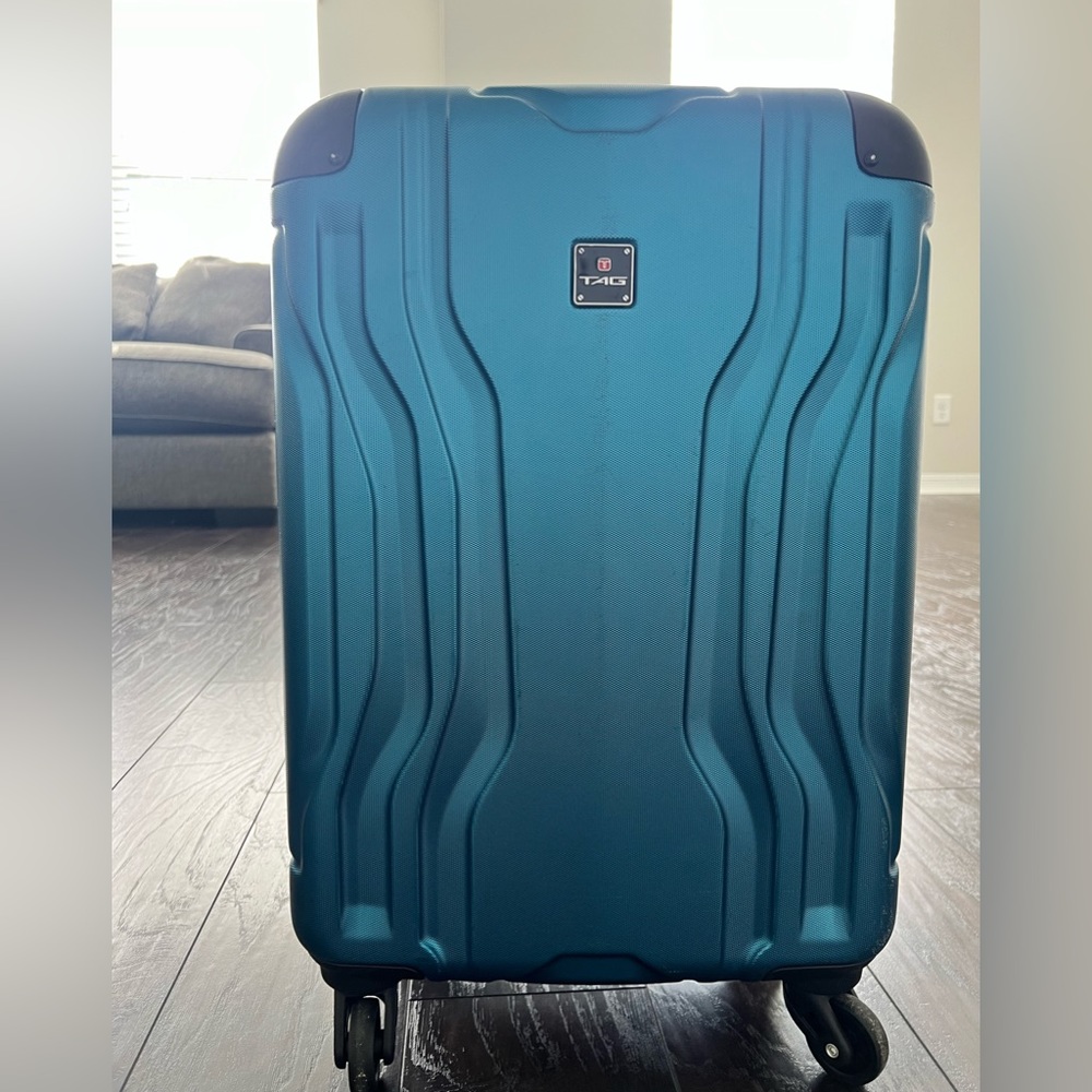 TAG Carry On Roller Luggage